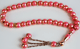 Chapelet "Sebha" de luxe rose 33 grains avec motifs en spirales dorees